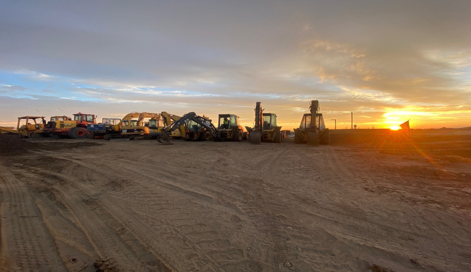 The LEARN Center yard at sunrise, with the equipment lineup